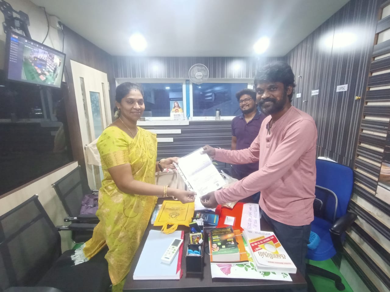 Achiever receiving certificate