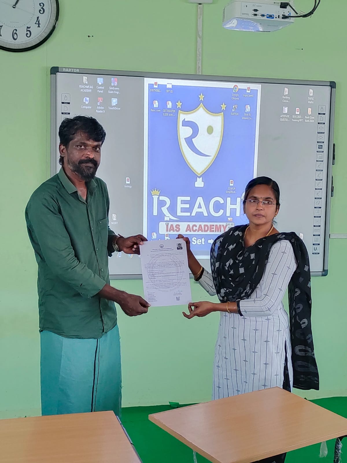 Achiever receiving certificate